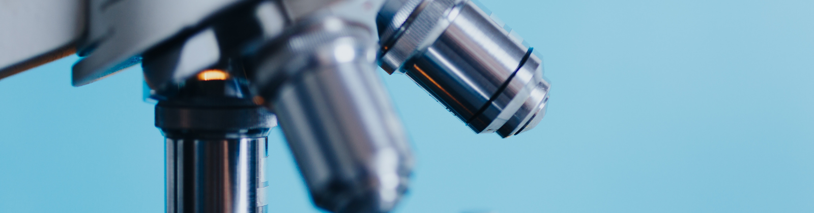 Microscope for research on a blue background
