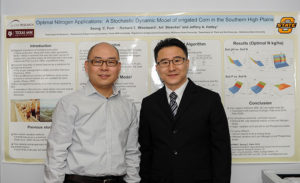 Dr Park shows off a research presentation poster